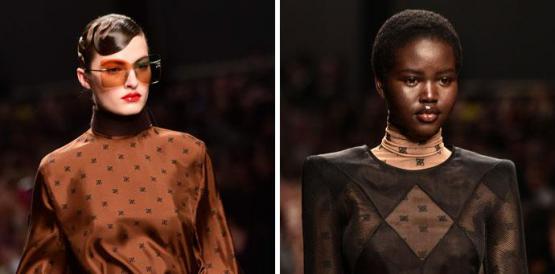 Dos modelos desfilan una de las últimas creaciones de Karl Lagerfeld con Fendi en Milán. Foto: AFP